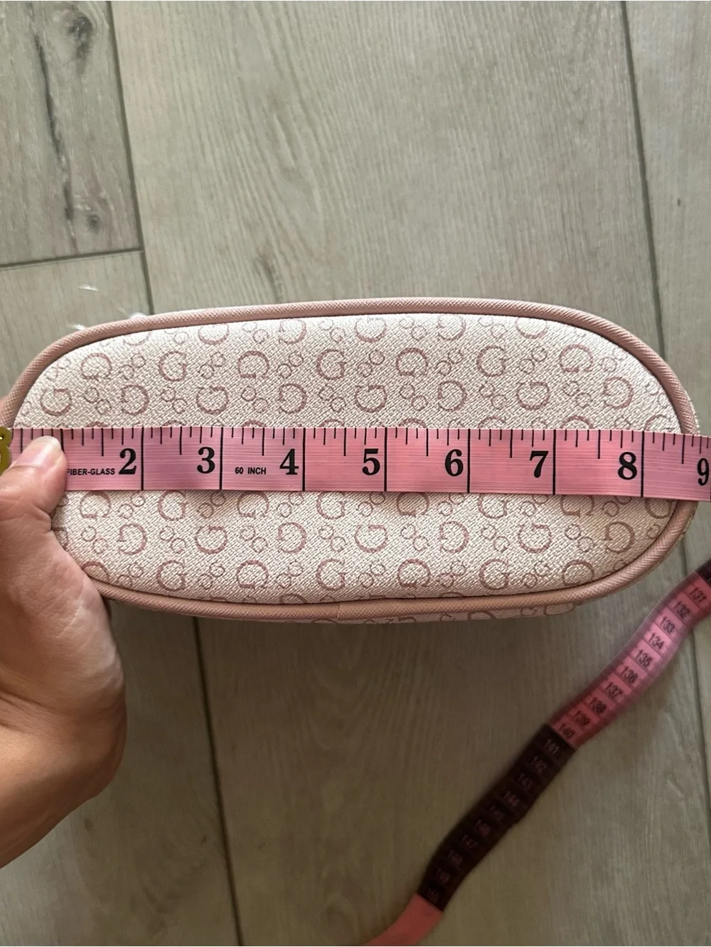 GUESS Blush Pink Logo Cosmetic Case with Gold Triangle Plaque